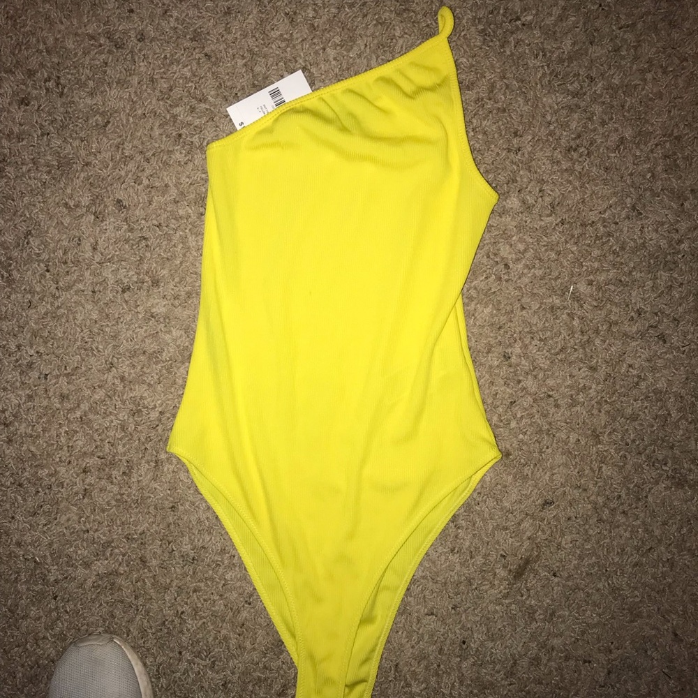 Bright yellow bodysuit